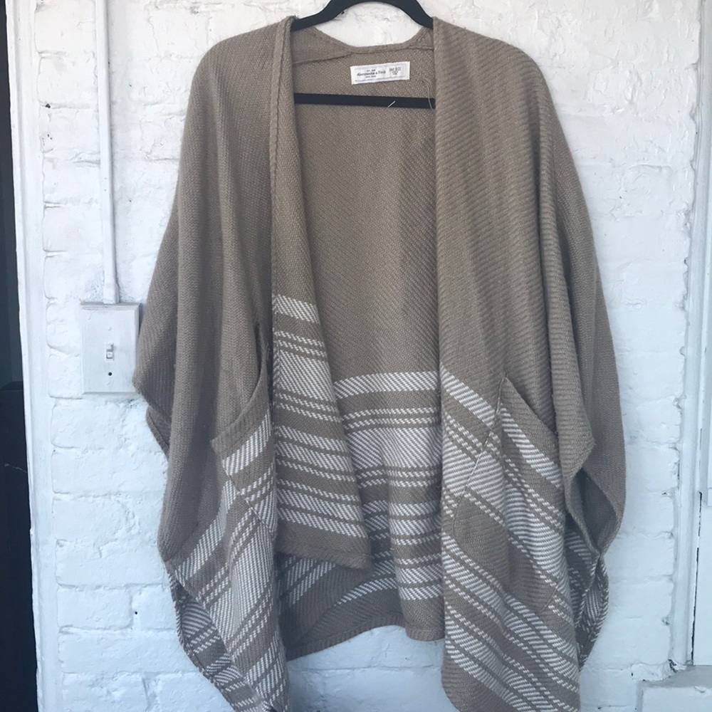 Poncho sweater with pockets